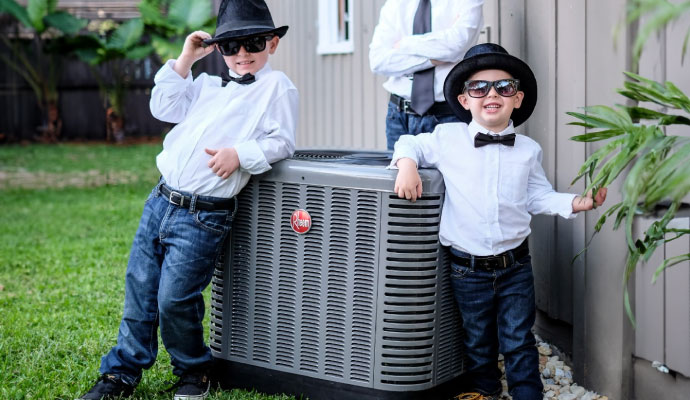 happy family with their air conditioner