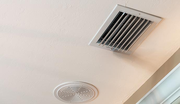 indoor air vents on a ceiling