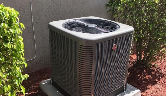 an outdoor air conditioning unit outside the house