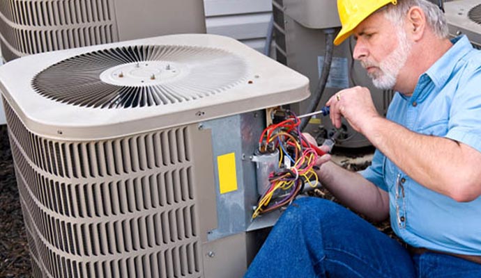 Expert repairing air conditioner.