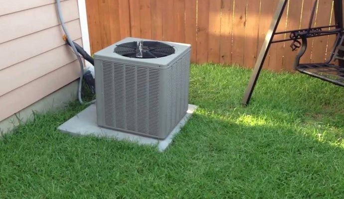 well maintained ac unit outside the house