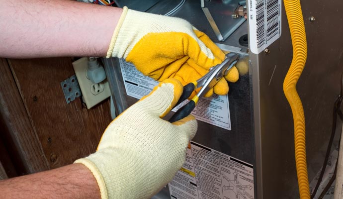 Person repairing heating system