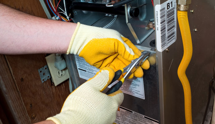 a professional installing a heating system