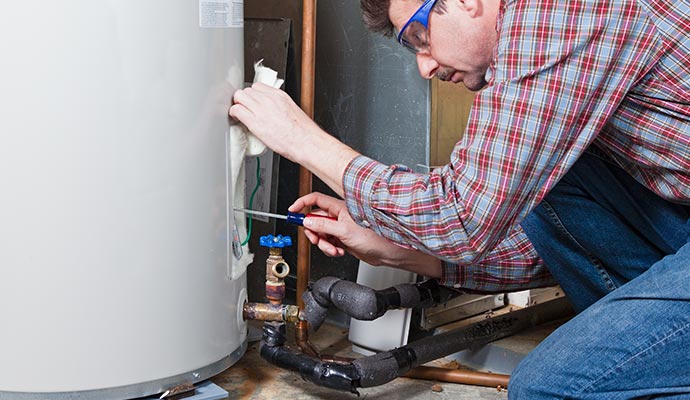 Person installing heating system