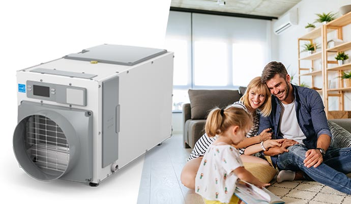 A happy family enjoying their time in dehumidifier installed room.